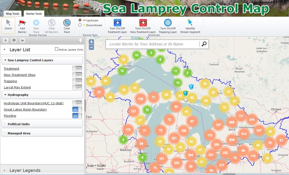 Screen shot from the Sea Lamprey Barrier Mapping Tool.  Shows a map with clusters of barriers in the great lakes basin.